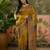 Mustard position print with zari weaving saree with contrast blouse piece
