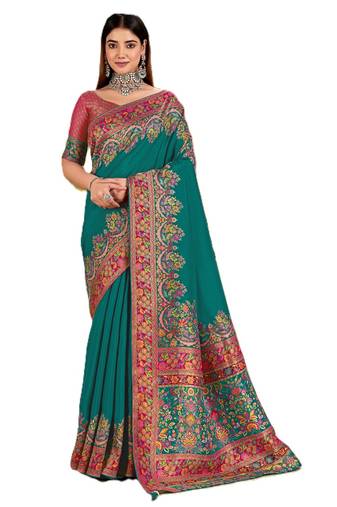 Teal position print with zari weaving saree with contrast blouse piece