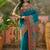 Teal position print with zari weaving saree with contrast blouse piece