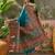 Teal position print with zari weaving saree with contrast blouse piece