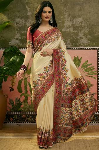 Off white position print with zari weaving saree with contrast blouse piece