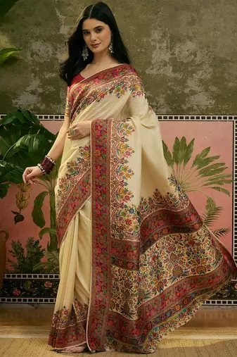 Off white position print with zari weaving saree with contrast blouse piece