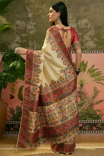 Off white position print with zari weaving saree with contrast blouse piece