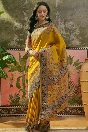 Yellow position print with zari weaving saree with contrast blouse piece