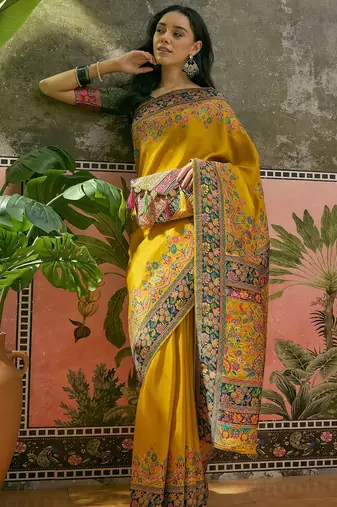 Yellow position print with zari weaving saree with contrast blouse piece