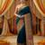 Teal viscose silk position print saree with contrast blouse piece