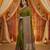 Green viscose silk position print saree with contrast blouse piece