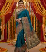 Blue viscose silk position print saree with contrast blouse piece