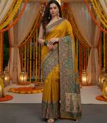 Mustard viscose silk position print saree with contrast blouse piece