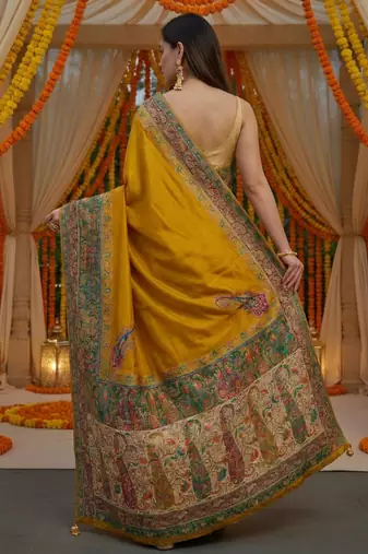 Mustard viscose silk position print saree with contrast blouse piece