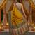 Mustard viscose silk position print saree with contrast blouse piece