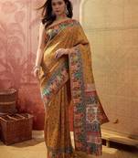 Mustard viscose silk position print saree with contrast blouse piece