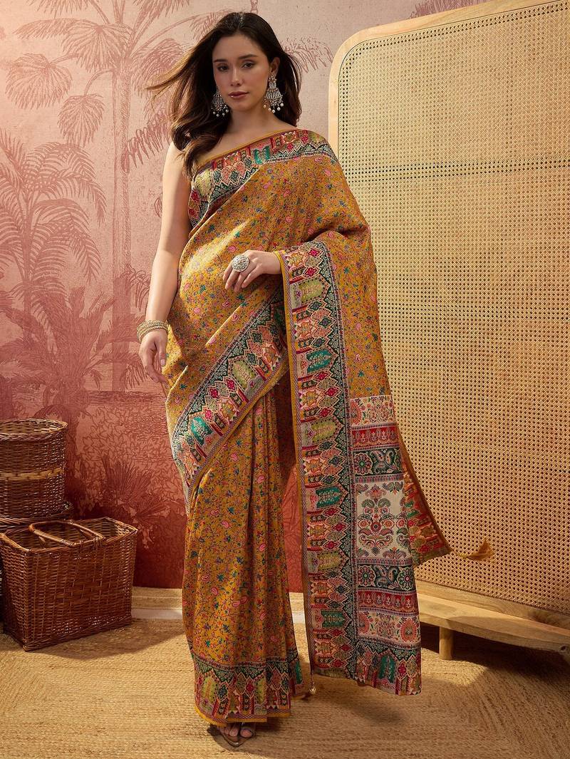 Mustard viscose silk position print saree with contrast blouse piece