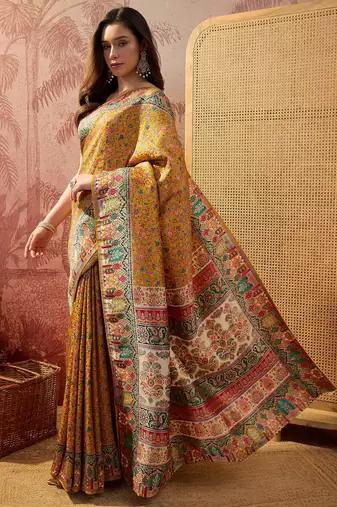 Mustard viscose silk position print saree with contrast blouse piece