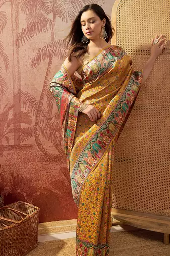 Mustard viscose silk position print saree with contrast blouse piece