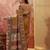Mustard viscose silk position print saree with contrast blouse piece