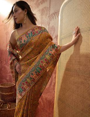 Mustard viscose silk position print saree with contrast blouse piece 5