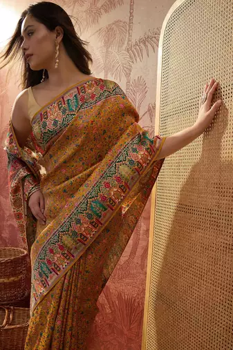 Mustard viscose silk position print saree with contrast blouse piece