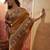 Mustard viscose silk position print saree with contrast blouse piece