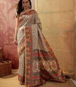 Off white viscose silk position print saree with contrast blouse piece