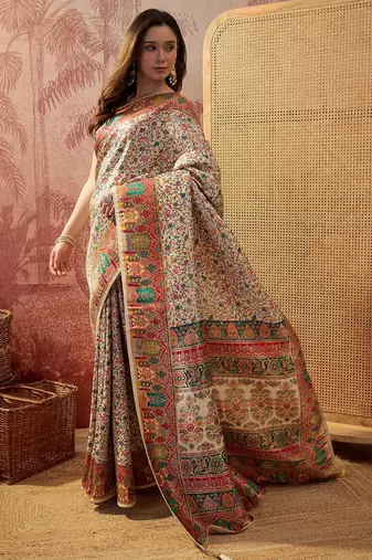 Off white viscose silk position print saree with contrast blouse piece