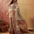 Off white viscose silk position print saree with contrast blouse piece