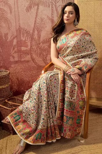Off white viscose silk position print saree with contrast blouse piece