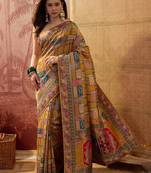 Mustard viscose silk position print saree with contrast blouse piece