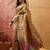 Mustard viscose silk position print saree with contrast blouse piece