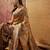 Mustard viscose silk position print saree with contrast blouse piece
