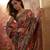 Pink viscose silk position print saree with contrast blouse piece