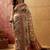 Off white viscose silk position print saree with contrast blouse piece