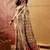 Off white viscose silk position print saree with contrast blouse piece