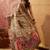 Off white viscose silk position print saree with contrast blouse piece