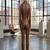 Women’s brown soft genuine lambskin leather utility long sleeve waist belted jumpsuit