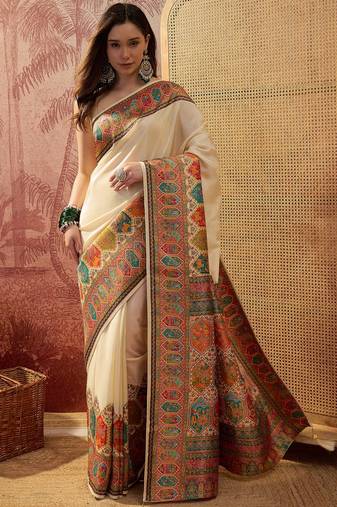 Off white viscose silk position print saree with contrast blouse piece