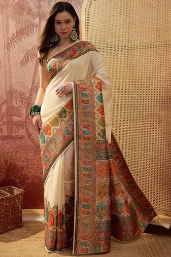 Off white viscose silk position print saree with contrast blouse piece