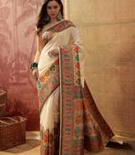 Off white viscose silk position print saree with contrast blouse piece