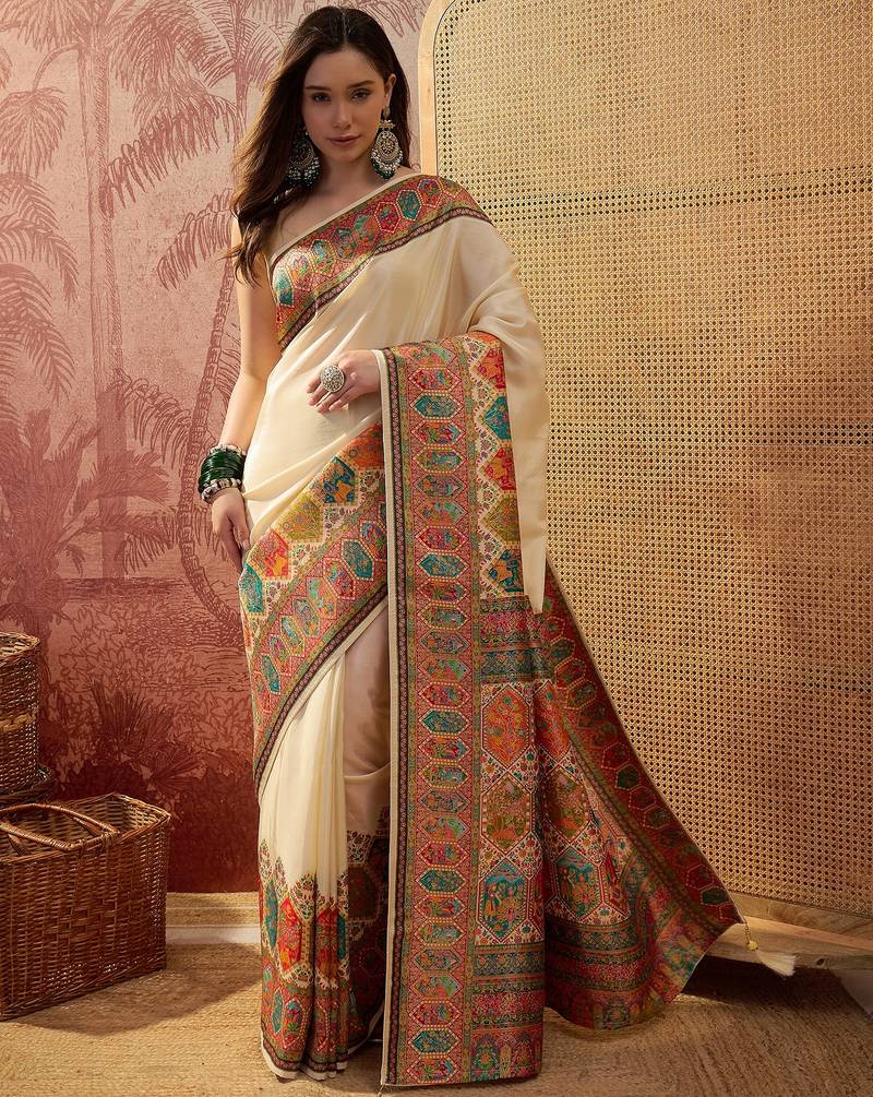 Off white viscose silk position print saree with contrast blouse piece