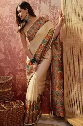 Off white viscose silk position print saree with contrast blouse piece
