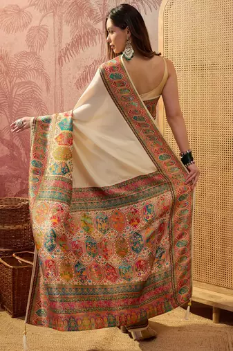 Off white viscose silk position print saree with contrast blouse piece