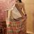 Off white viscose silk position print saree with contrast blouse piece