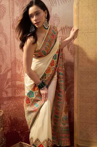 Off white viscose silk position print saree with contrast blouse piece