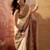 Off white viscose silk position print saree with contrast blouse piece