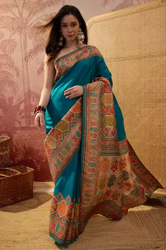 Teal viscose silk position print saree with contrast blouse piece