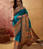 Teal viscose silk position print saree with contrast blouse piece