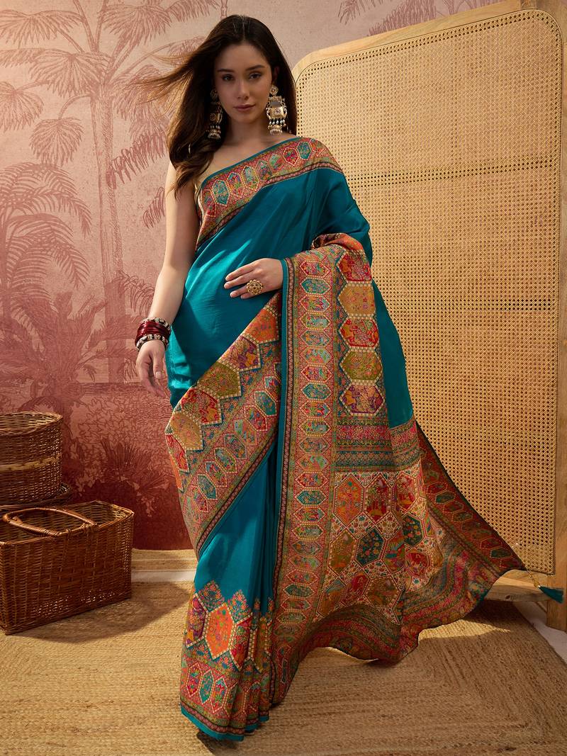 Teal viscose silk position print saree with contrast blouse piece