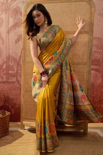 Mustard viscose silk position print saree with contrast blouse piece