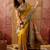 Mustard viscose silk position print saree with contrast blouse piece