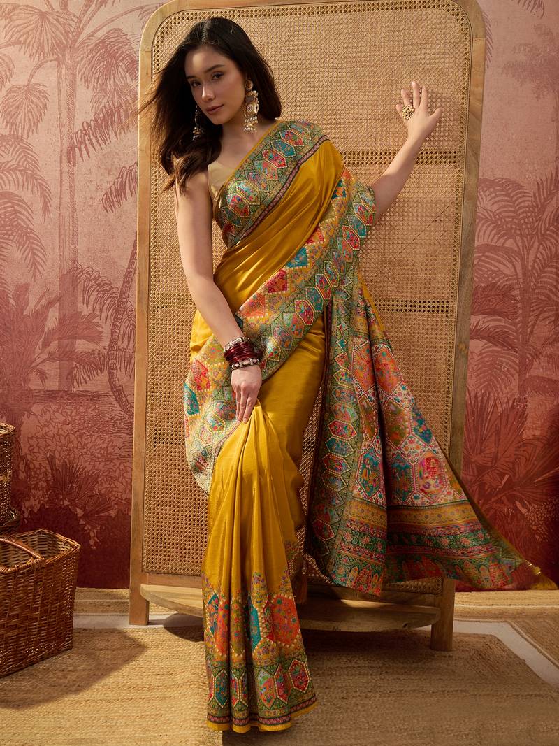 Mustard viscose silk position print saree with contrast blouse piece